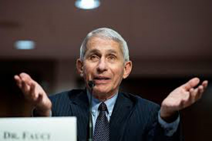 FILE PHOTO: Anthony Fauci, director of the National Institute of Allergy and Infectious Diseases, speaks during a Senate Health, Education, Labor and Pensions Committee hearing on efforts to get back to work and school during the coronavirus disease (COVID-19) outbreak, in Washington, D.C., US June 30, 2020. Al Drago/Pool via REUTERS