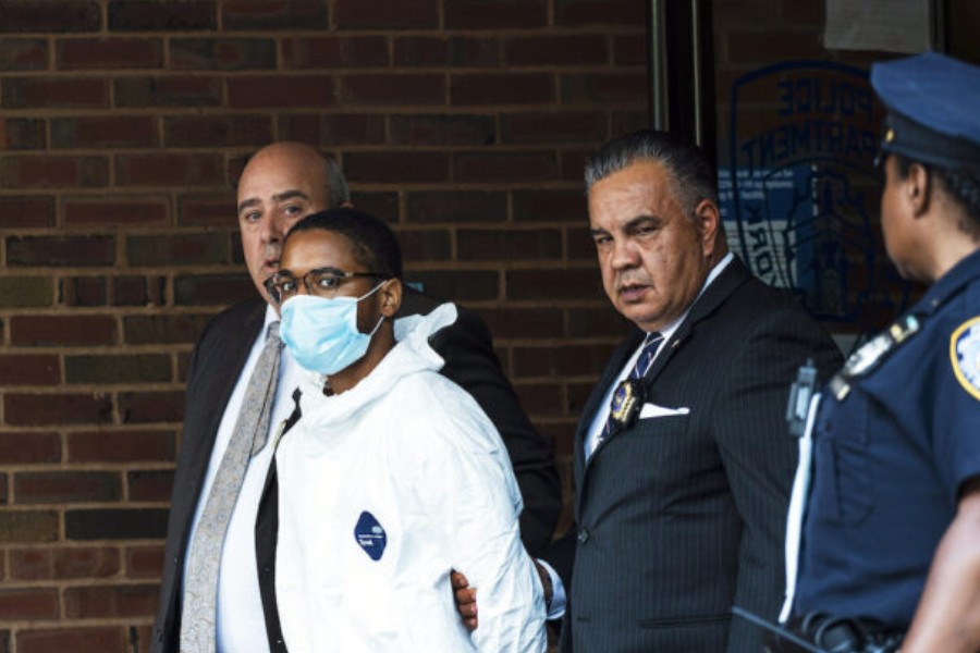 Tyrese Devon Haspil, 21, is walked out of NYPD 7th precinct after been charged with second-degree murder in the death of the 33-year-old tech CEO Fahim Saleh, in New York, on July 17, 2020. (AP Photo/Eduardo Munoz Alvarez)