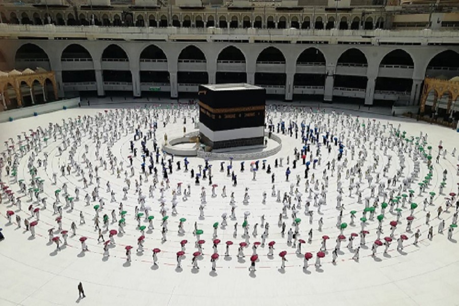 Hundreds of Muslim pilgrims circle the Kaaba, the cubic building at the Grand Mosque, as they observe social distancing to protect themselves against the coronavirus, in the Muslim holy city of Mecca, Saudi Arabia, Wednesday, July 29, 2020 — AP