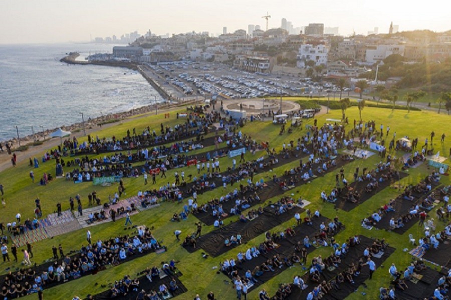 Muslim worshippers offer Eid al-Adha prayer at a park as mosques are limited for ten people following the government's measures to help stop the spread of the coronavirus, in the mixed Arab Jewish city of Jaffa, near Tel Aviv, Israel, Friday, July 31, 2020 — AP