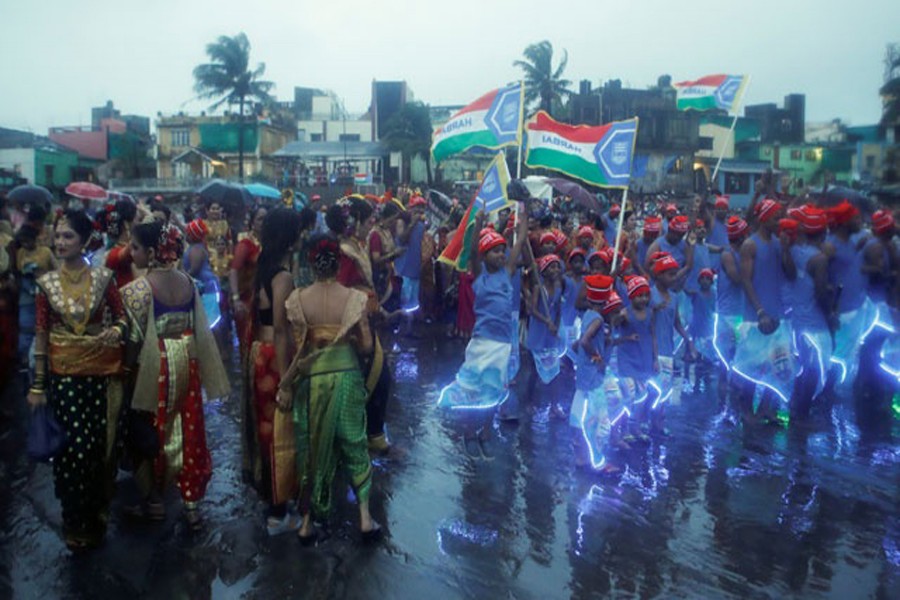 People from the fishing community celebrate Narali Purnima or coconut festival amidst the spread of the coronavirus disease (COVID-19) in Mumbai, India, Aug 3, 2020. REUTERS