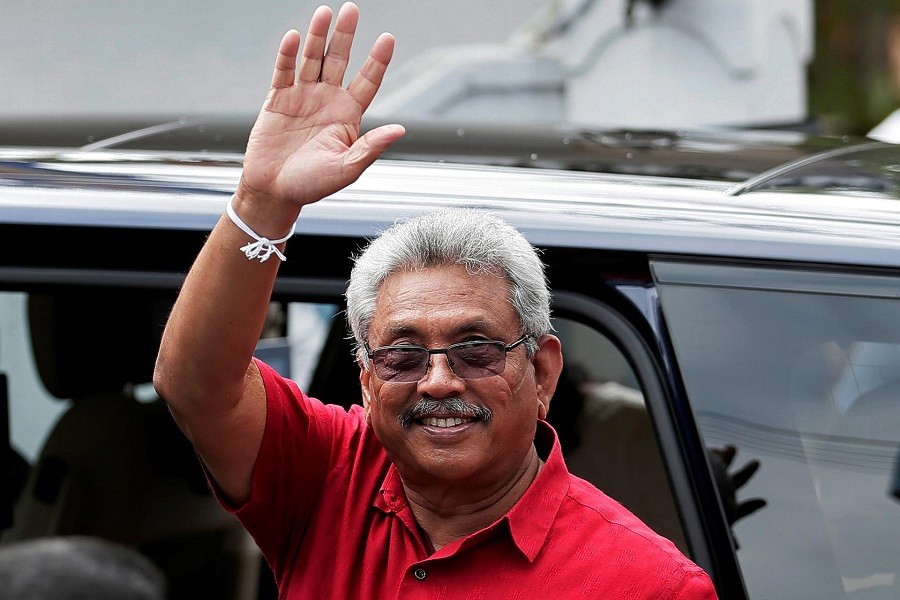 Sri Lanka's President Gotabaya Rajapaksa waves at his supporters as he leaves a polling station after casting his vote during the country's parliamentary election in Colombo, Sri Lanka, August 05, 2020 — Reuters
