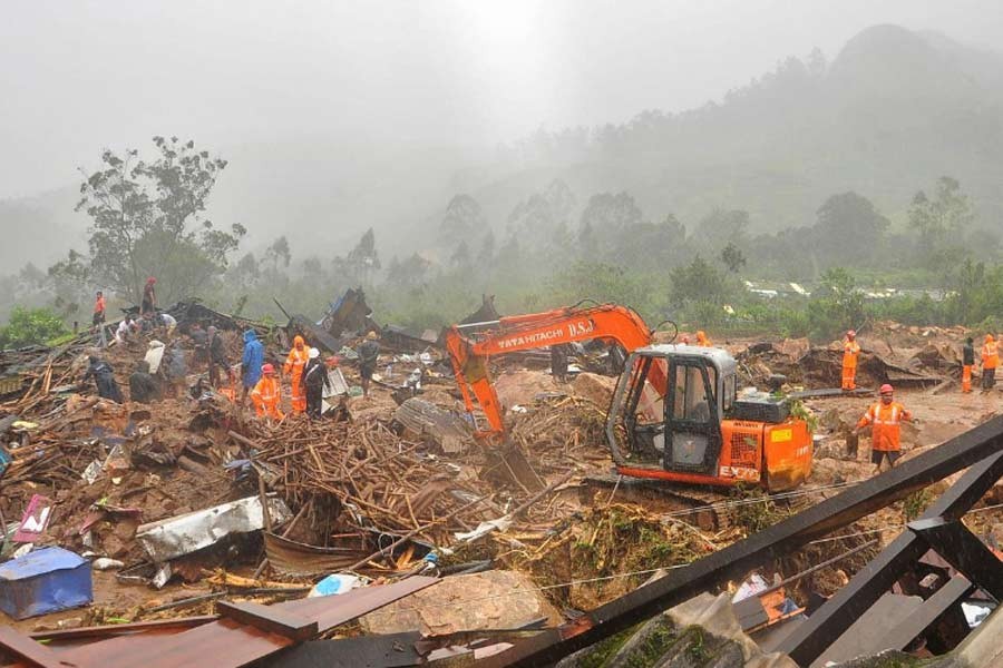 Rescue workers looking for survivors at the site of a landslide during heavy rains in Kerala on Friday –Reuters Photo