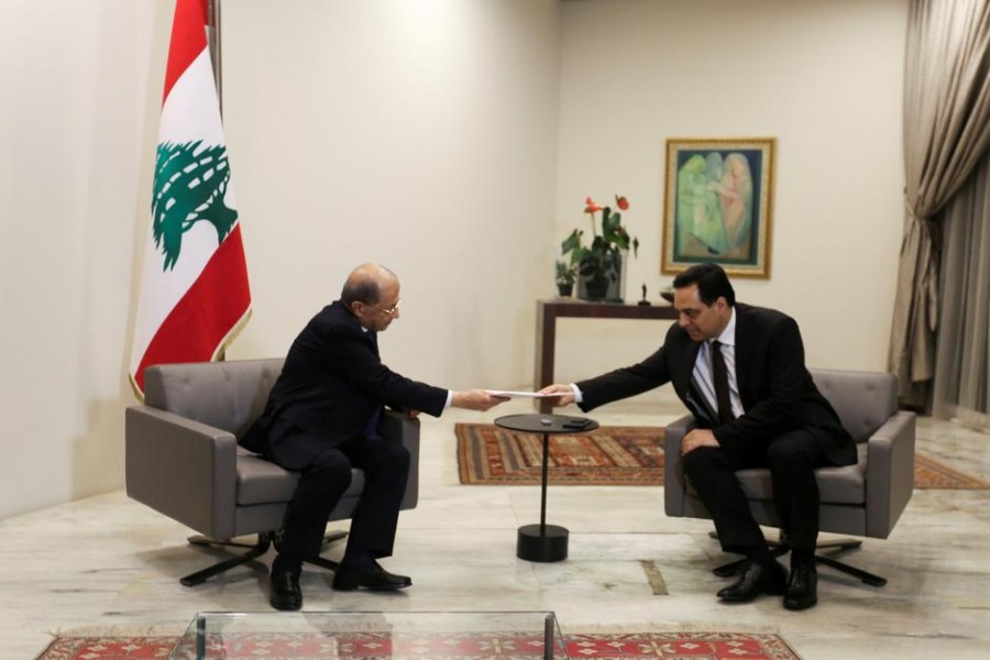 Lebanon's Prime Minister Hassan Diab submits his resignation to Lebanon's President Michel Aoun at the presidential palace in Baabda, Lebanon, August 10, 2020 — Reuters/Files