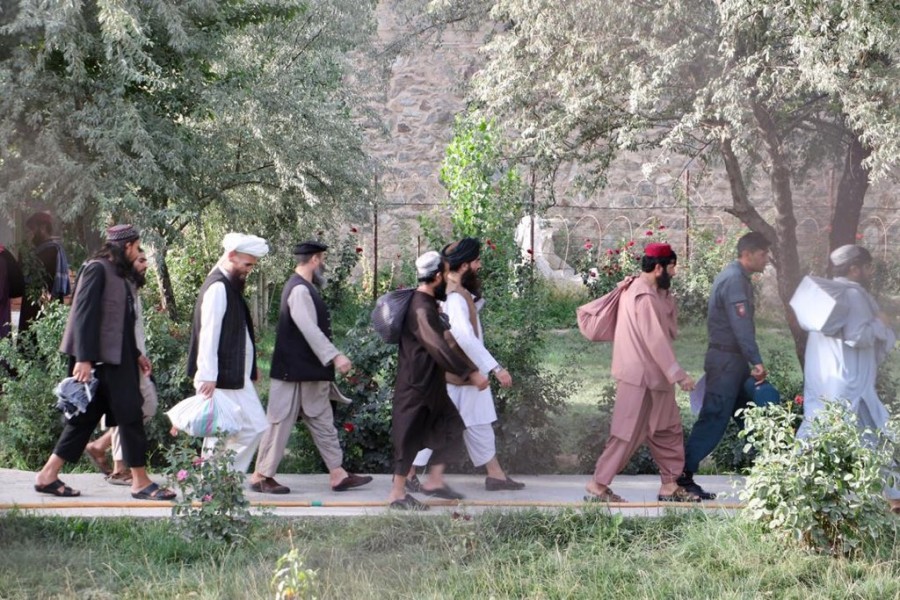 Newly freed Taliban prisoners walk at Pul-e-Charkhi prison, in Kabul, Afghanistan on August 13, 2020. National Security Council of Afghanistan/Handout via REUTERS