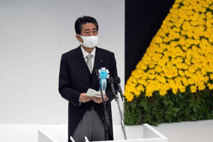 Japan’s Prime Minister Shinzo Abe making a speech during a memorial service marking the 75th anniversary of Japan's surrender in World War II at the Nippon Budokan hall on Saturday in Tokyo –Reuters Photo