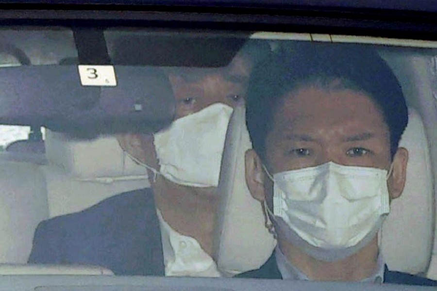 Japanese Prime Minister Shinzo Abe arrives by a car at Keio University Hospital, amid speculation about his health, in Tokyo, Japan, in this photo taken by Kyodo, August 24, 2020 — Reuters