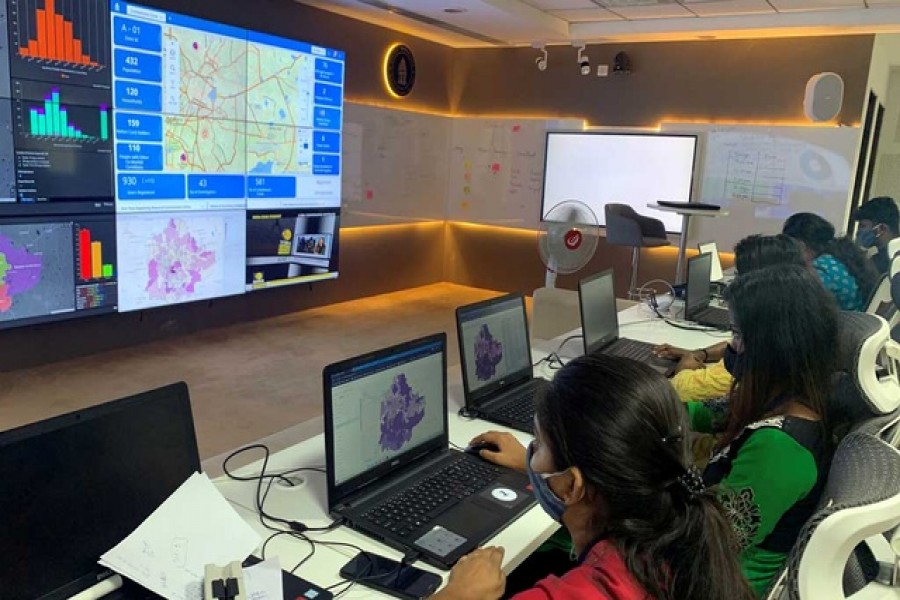 Software professionals assisting municipal authorities work on their terminals inside a "war room" focused on tracking the spread of the coronavirus disease (Covid-19) at the Bruhat Bengaluru Mahanagara Palike office in Bengaluru, India, July 02, 2020 — Reuters/Files