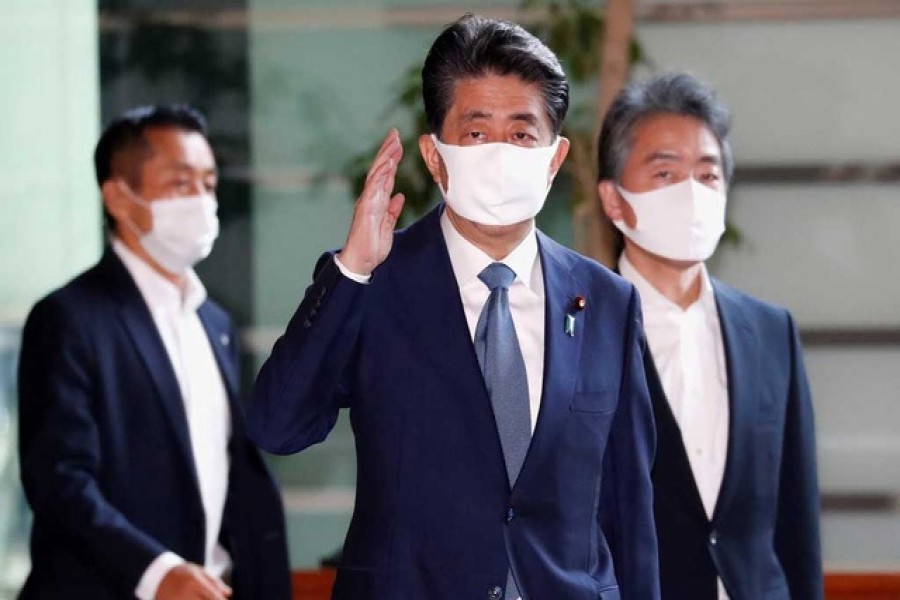 Japan's Prime Minister Shinzo Abe wearing a protective face mask arrives at his official residence, amid the coronavirus disease (Covid-19) outbreak, in Tokyo, Japan, August 28, 2020 — Reuters