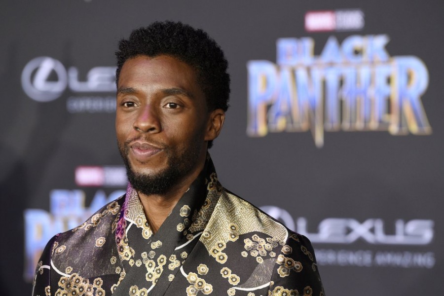 In this Jan. 29, 2018 file photo, Chadwick Boseman, a cast member in "Black Panther," poses at the premiere of the film in Los Angeles - Photo by Chris Pizzello/Invision/AP, File
