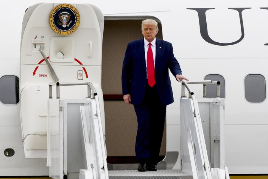 US President Donald Trump walks from Air Force One as he arrives at Waukegan National Airport before attending a series of events in Kenosha, WI on Tuesday, September 1, 2020, in Waukegan, IL — AP Photo