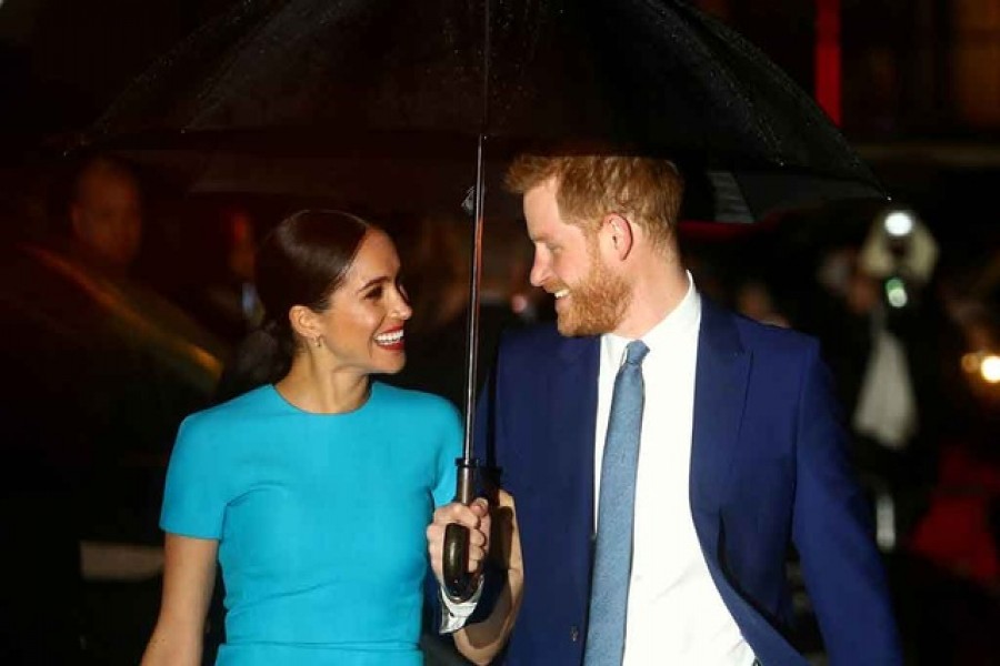 FILE PHOTO: Britain's Prince Harry and his wife Meghan, Duchess of Sussex, arrive at the Endeavour Fund Awards in London, Britain March 5, 2020. REUTERS