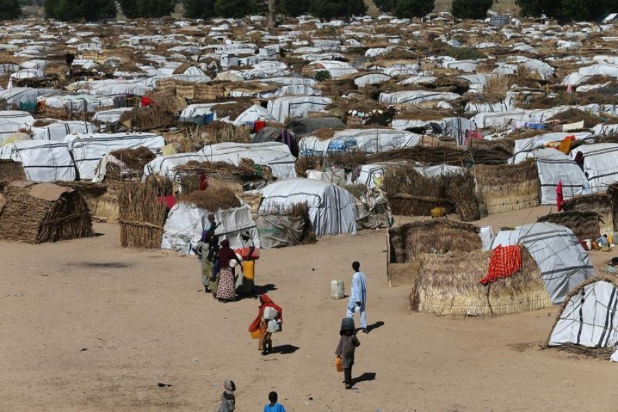 Some people seen moving within their thatched houses at the Muna Internally Displaced Persons Camp in Maiduguri, Nigeria on December 01, 2016 — Reuters/Files