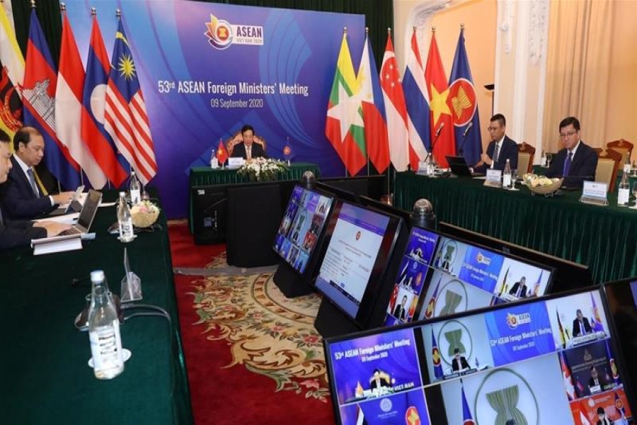 Vietnam's Deputy Prime Minister and Foreign Minister Pham Binh Minh chair an ASEAN video meeting [VNA via Reuters]