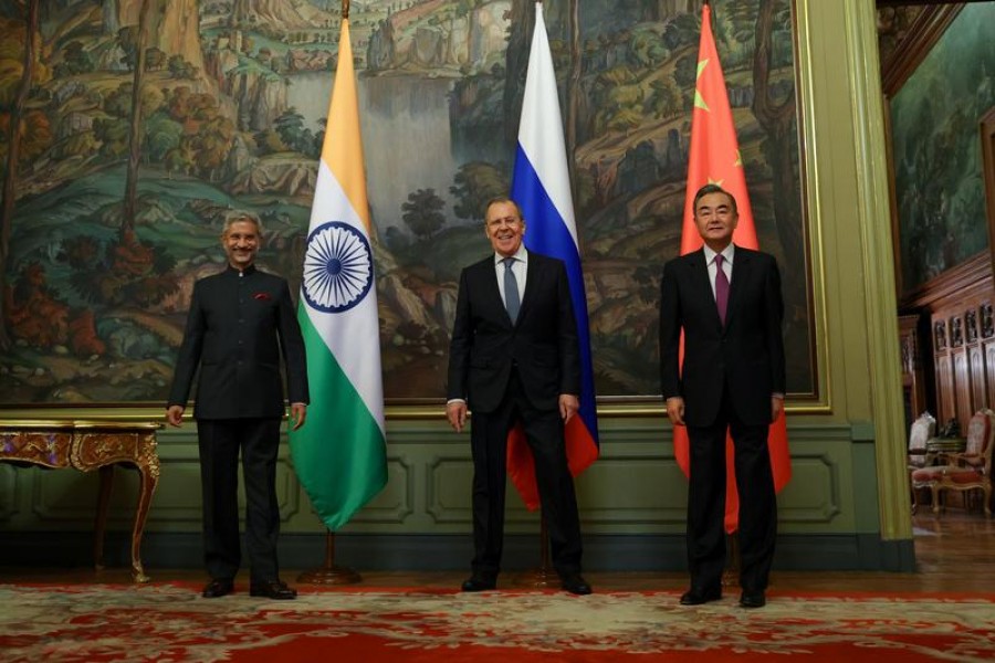 Russia’s Foreign Minister Sergei Lavrov, India’s Foreign Minister S. Jaishankar and Chin’s State Councillor Wang Yi pose for a picture during a meeting in Moscow, Russia, September 10, 2020 — Russian Foreign Ministry/Handout via Reuters