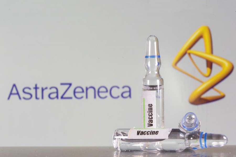 A test tube labelled with the Vaccine is seen in front of AstraZeneca logo in this illustration taken on September 9, 2020 — Reuters photo