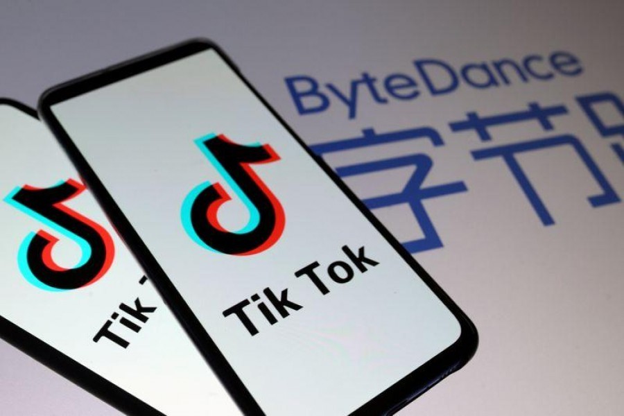 Tik Tok logos are seen on smartphones in front of a displayed ByteDance logo in this illustration taken on November 27, 2019 — Reuters/Files