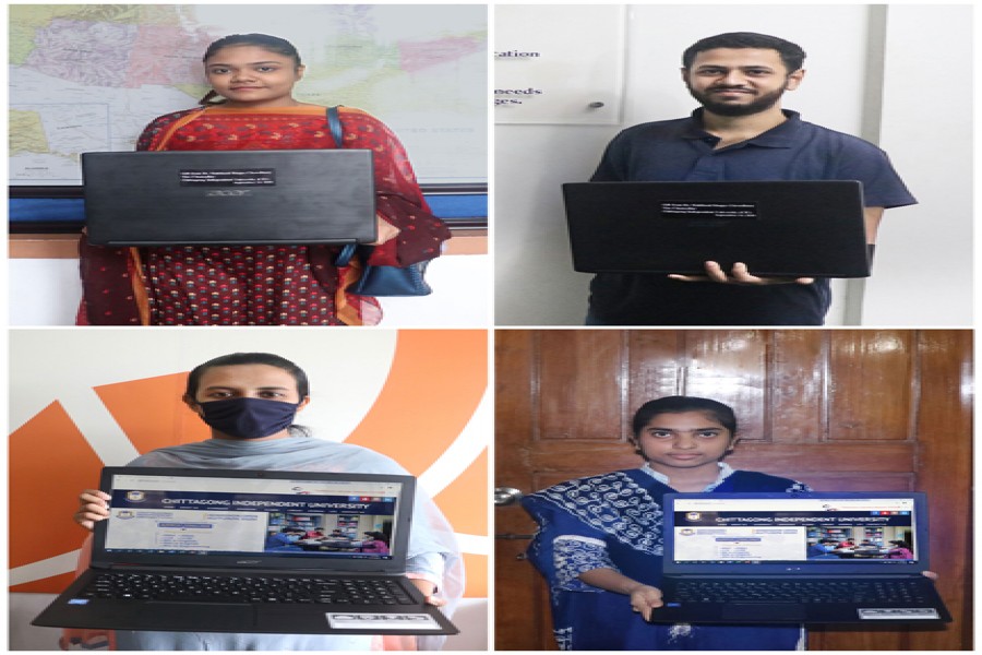 Four students receive laptops from CIU VC
