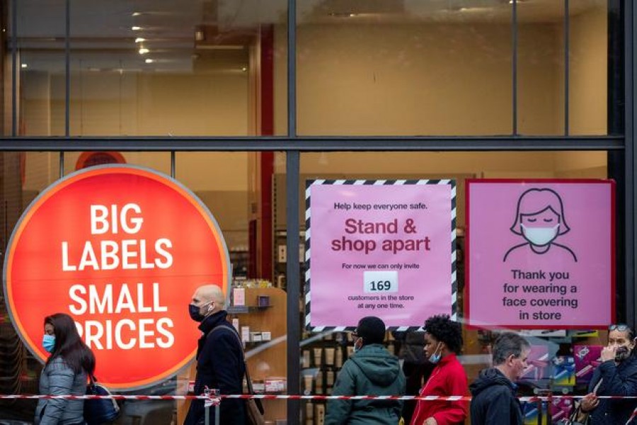 Shoppers queue to enter a TK Maxx store in Brixton amid the spread of the coronavirus disease (Covid-19), in London, Britain on September 27, 2020 — Reuters photo