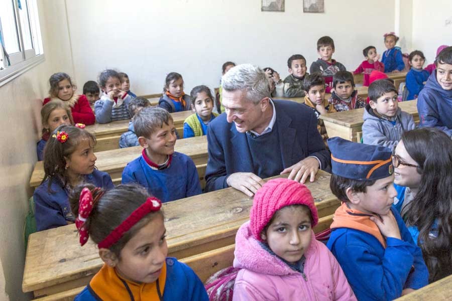 UNHCR chief Filippo Grandi chats with pupils at the Al-Shuhada School in Souran, Syria	–UNHCR Photo