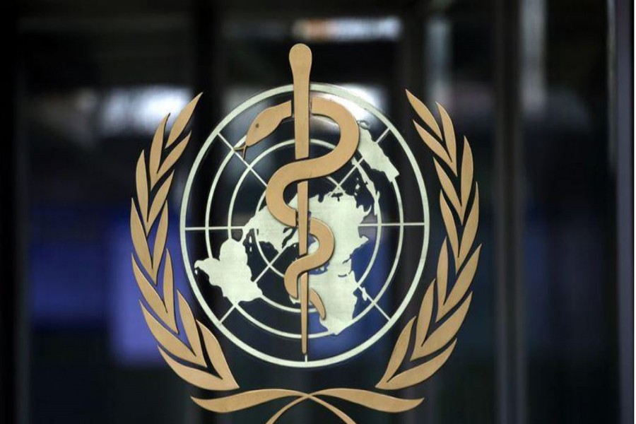 FILE PHOTO: A logo is pictured on the headquarters of the World Health Orgnaization (WHO) ahead of a meeting of the Emergency Committee on the novel coronavirus (2019-nCoV) in Geneva, Switzerland, January 30, 2020. REUTERS/Denis Balibouse