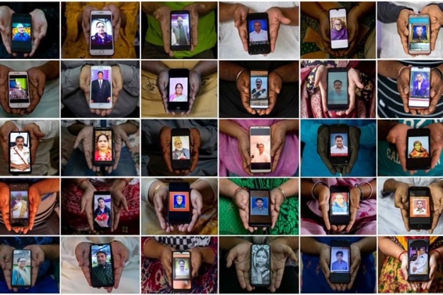 A combination picture shows people holding their mobile phones, showing images of their relatives who died due to the coronavirus disease (COVID-19), as they pose for a photo taken between Sept 22, 2020 and Sept 28 2020, in various cities in India. REUTERS