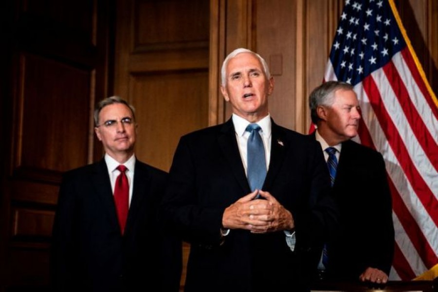 US Vice President Mike Pence speaks, with White House Counsel Pat Cipollone and White House Chief of Staff Mark Meadows behind him, during a meeting with Judge Amy Coney Barrett, US President Donald Trump's nominee to the Supreme Court, and Senate Majority Leader Mitch McConnell (R-KY) (both not pictured) in the Capitol, in Washington, DC, US, September 29, 2020 — Reuters