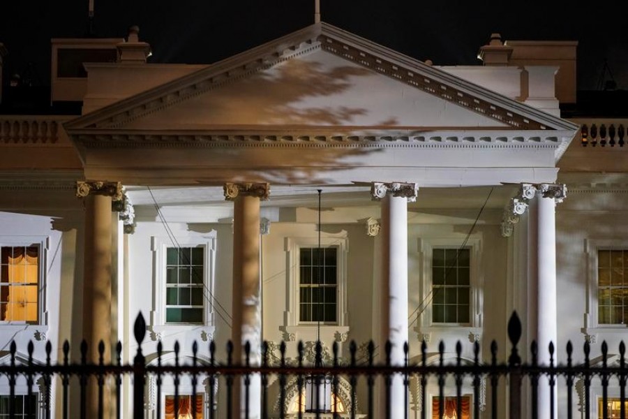 The White House is lit before dawn after US President Donald Trump announced that he and US first lady Melania Trump have both tested positive for the coronavirus disease (Covid-19) in Washington, US, October 2, 2020 — Reuters