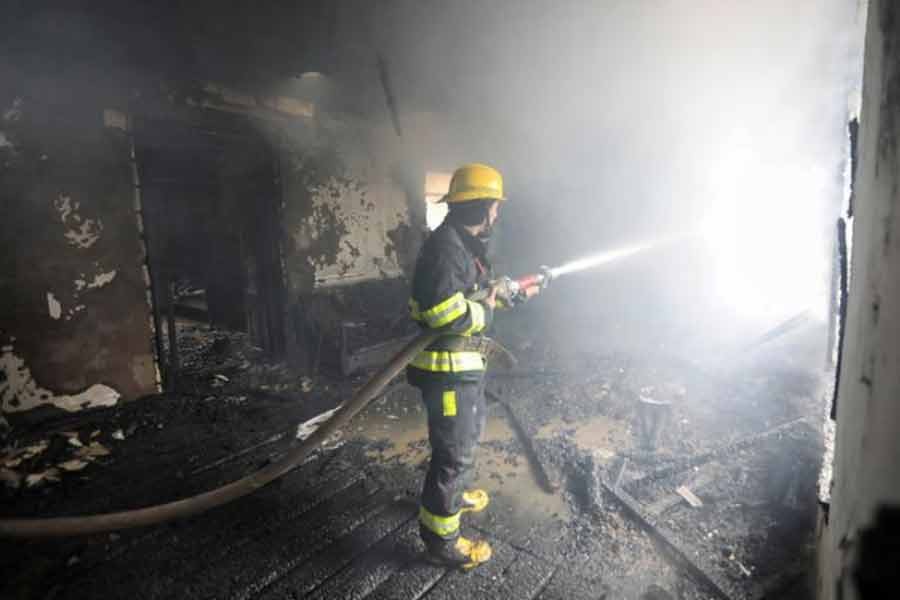 A firefighter extinguishing a fire in a house caused by shelling in the fighting over the breakaway region of Nagorno-Karabakh in the town of Barda, Azerbaijan on Monday –Reuters Photo