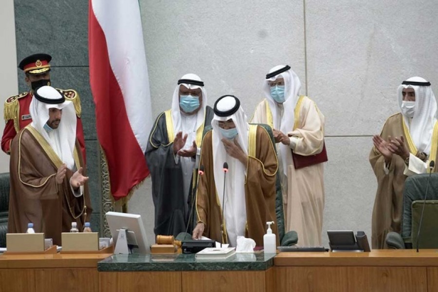 Kuwait's new Emir Nawaf al-Ahmad al-Sabah takes the oath of office at the parliament, in Kuwait City, Kuwait September 30, 2020. REUTERS/Stephanie McGehee/