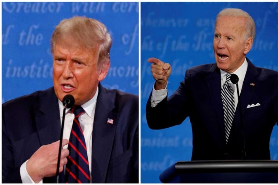 A combination picture shows US President Donald Trump and Democratic presidential nominee Joe Biden speaking during the first 2020 presidential campaign debate, held on the campus of the Cleveland Clinic at Case Western Reserve University in Cleveland, Ohio, US, September 29, 2020 -- Reuters/Files