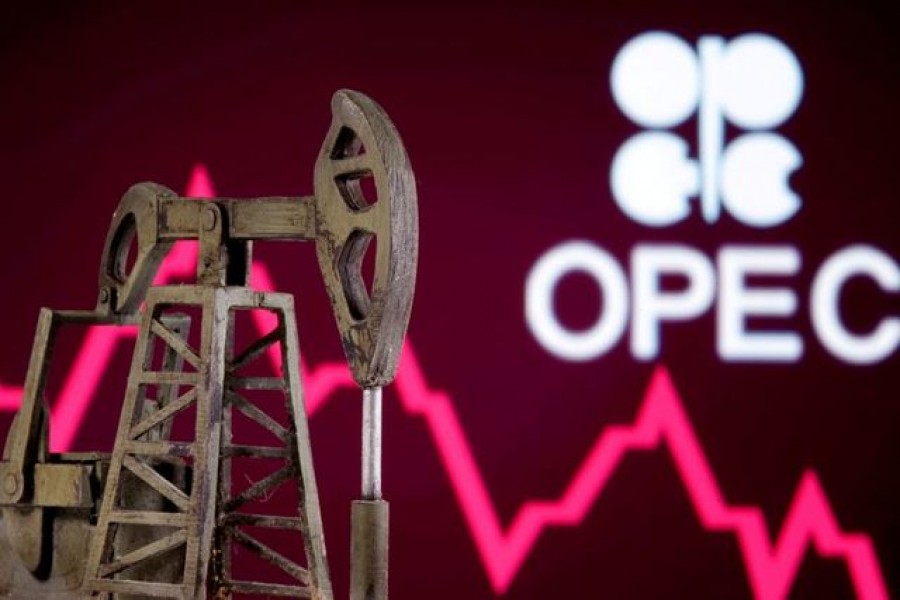 FILE PHOTO: A 3D printed oil pump jack is seen in front of displayed stock graph and Opec logo in this illustration picture, April 14, 2020. REUTERS/Dado Ruvic/File Photo