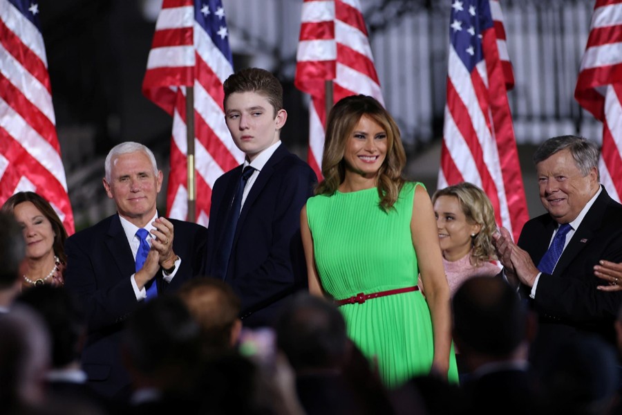 US first lady Melania Trump stands with her son Barron as second lady Karen Pence, Vice President Mike Pence and the first lady's father Viktor Knavs applaud US President Donald Trump during the final event of the Republican National Convention on the South Lawn of the White House in Washington, US on August 27, 2020 — Reuters/Files
