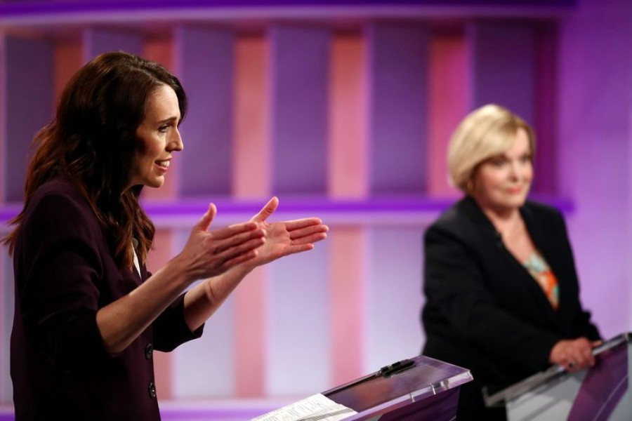 New Zealand Prime Minister Jacinda Ardern (L) and National leader Judith Collins participate in a televised debate at TVNZ in Auckland, New Zealand, September 22, 2020. Fiona Goodall/Pool via REUTERS