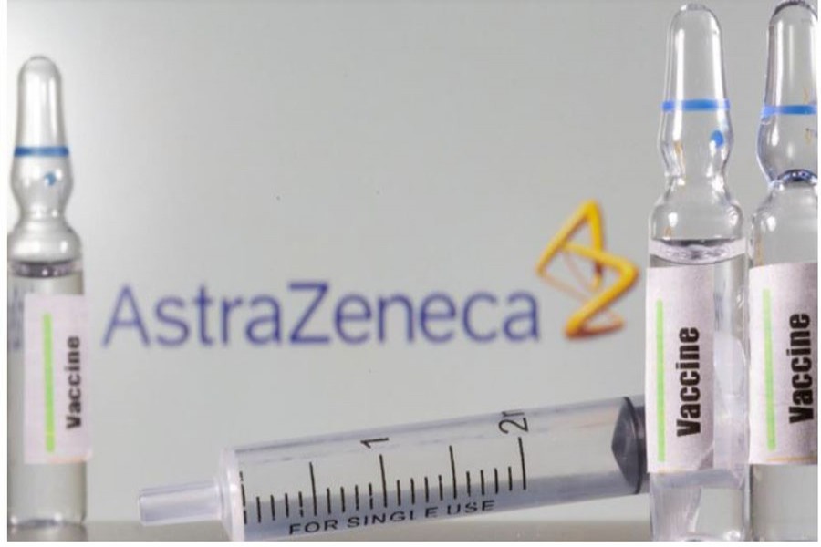 A test tube labelled vaccine is seen in front of AstraZeneca logo in this illustration taken, September 09, 2020. REUTERS