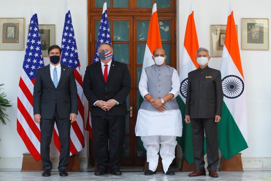 US Secretary of State Mike Pompeo, US Secretary of Defense Mark Esper pose for a picture with India's Foreign Minister Subrahmanyam Jaishankar and India’s Defence Minister Rajnath Singh during a photo opportunity ahead of their meeting at Hyderabad House in New Delhi, India, October 27, 2020 — Reuters