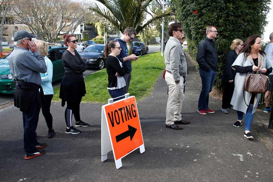 Voters waiting outside a polling station at the St Heliers Tennis Club during the general election in Auckland of New Zealand last month –Reuters Photo
