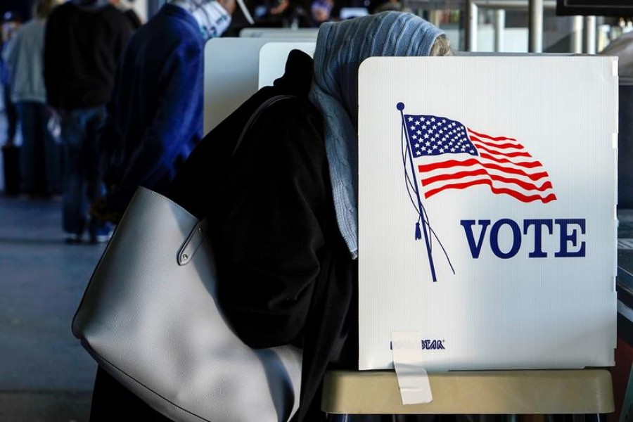 A voter fills out her ballot during early voting at ONEOK Field in Tulsa, Oklahoma, US on October 30, 2020 — Reuters photo