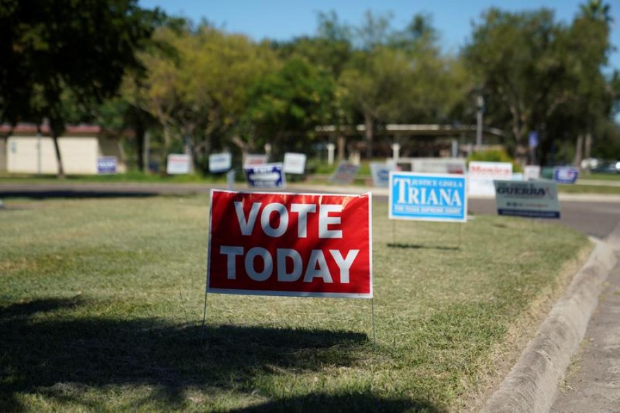 A voting sign is seen outside of a polling site in McAllen, Texas, US, October 30, 2020 -- Reuters