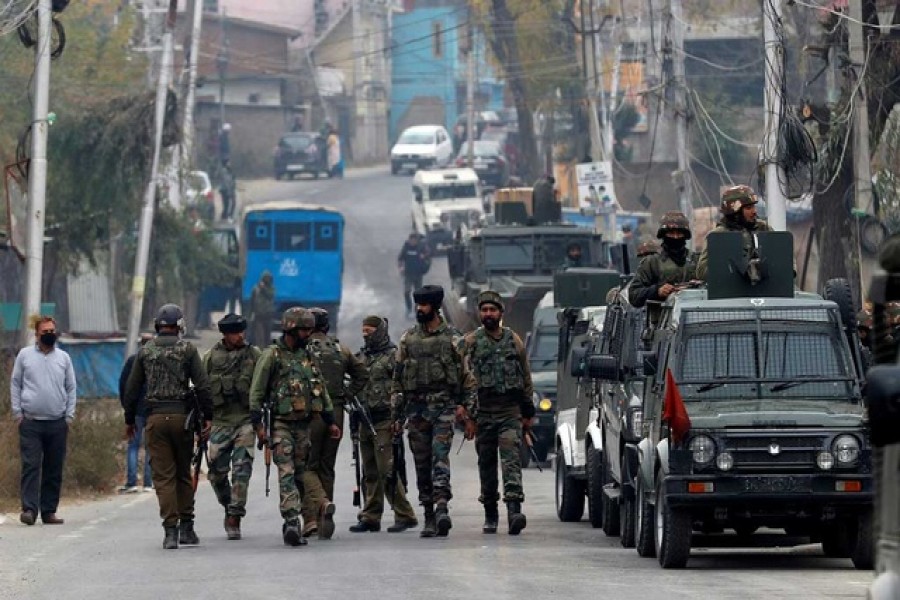 Indian soldiers leave a gun battle site after a suspected militant commander was killed in a gun battle between Indian security forces and suspected militants, at Rangreth on the outskirts of Srinagar, Nov 1, 2020. REUTERS