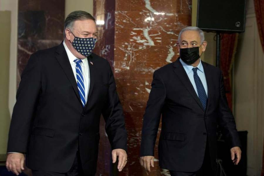 US Secretary of State Mike Pompeo, left, and Israeli Prime Minister Benjamin Netanyahu leaving after making a joint statement in Jerusalem on November 19 –Reuters photo