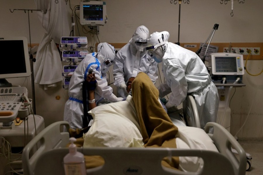 Representational Image: Medical workers wearing personal protective equipment (PPE) take care of a patient suffering from the coronavirus disease (COVID-19), at the Intensive Care Unit (ICU) of the Max Smart Super Speciality Hospital in New Delhi, India, May 28, 2020. Reuters