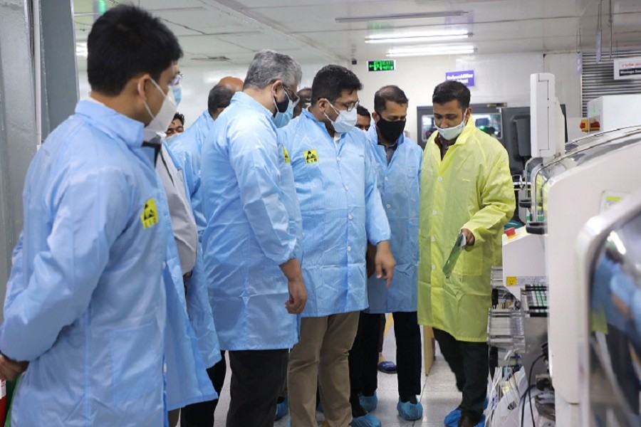 A team of nine teachers from Dhaka University's business faculty visits the Walton factory at Chandra in Gazipur on Saturday.