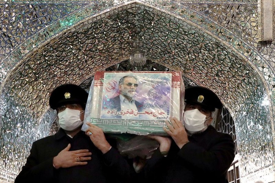 Servants of the holy shrine of Imam Reza carry the coffin of Iranian nuclear scientist Mohsen Fakhrizadeh, in Mashhad, Iran on November 29, 2020 — West Asia News Agency via REUTERS