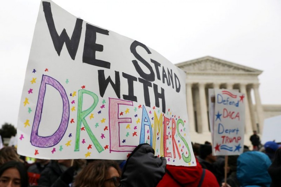 Demonstrators rally outside the U.S. Supreme Court as justices were scheduled to hear oral arguments in the consolidation of three cases before the court regarding the Trump administration’s bid to end the Deferred Action for Childhood Arrivals (DACA) program in Washington, US, November 12, 2019. REUTERS/Jonathan Ernst/File Photo