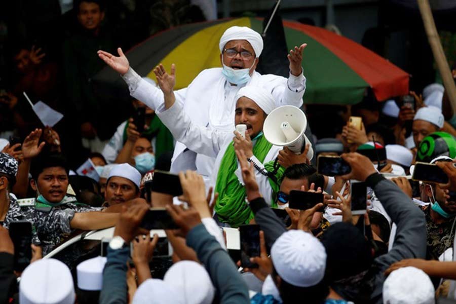 Rizieq Shihab, the leader of Indonesian Islamic Defenders Front (FPI), is greeted by supporters at the Tanah Abang in Jakarta last month –Reuters file photo