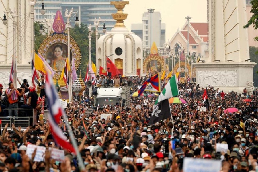 Pro-democracy demonstrators march during a Thai anti-government mass protest, on the 47th anniversary of the 1973 student uprising, in Bangkok, Thailand October 14, 2020. REUTERS