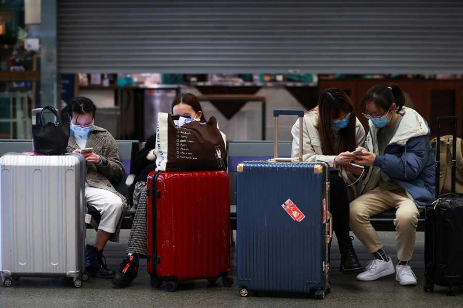 Travellers with their suitcases sitting at the Eurostar terminal at St Pancras International in London on Monday as EU countries impose a travel ban from the UK following the outbreak of new strain of coronavirus –Reuters Photo