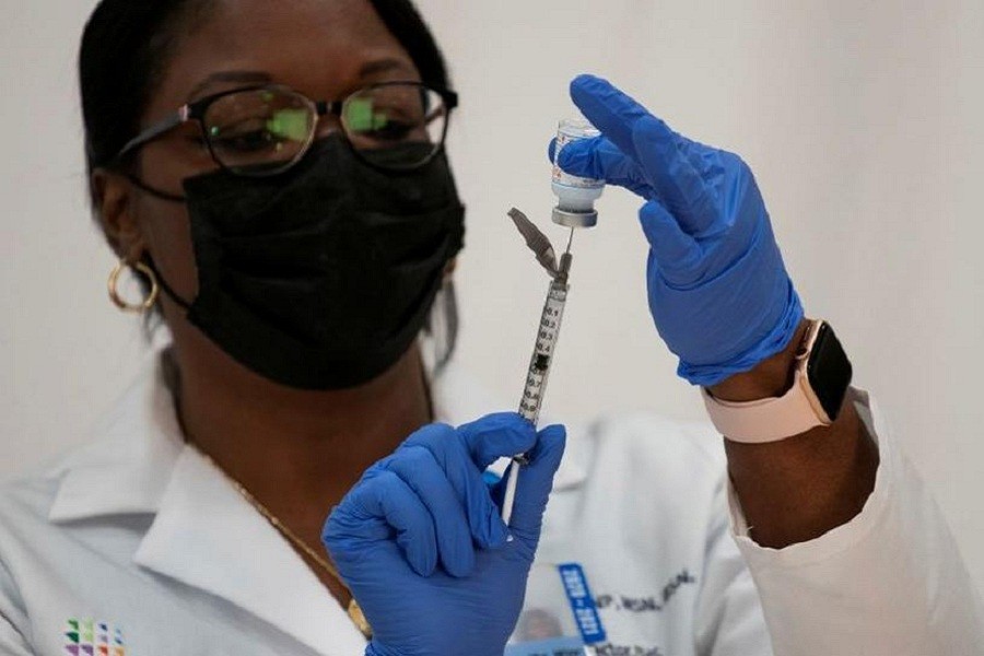 Michelle Chester, DNP, director, employee health services, Northwell prepares the Moderna coronavirus disease (Covid-19) vaccine at Northwell Health's Long Island Jewish Valley Stream hospital in New York, US, December 21, 2020 — Reuters/Files