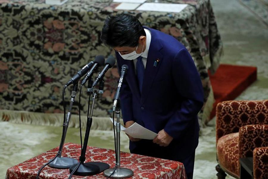 Japan's Shinzo Abe apologises, corrects statements on funding scandal